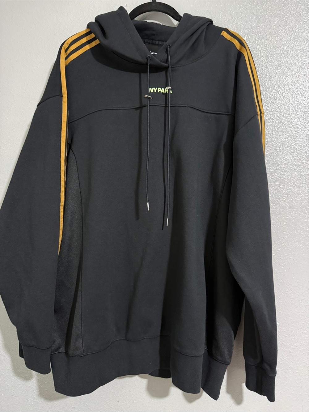 IVY PARK X Adidas Black Hoodie with Gold Shoulder Stripes